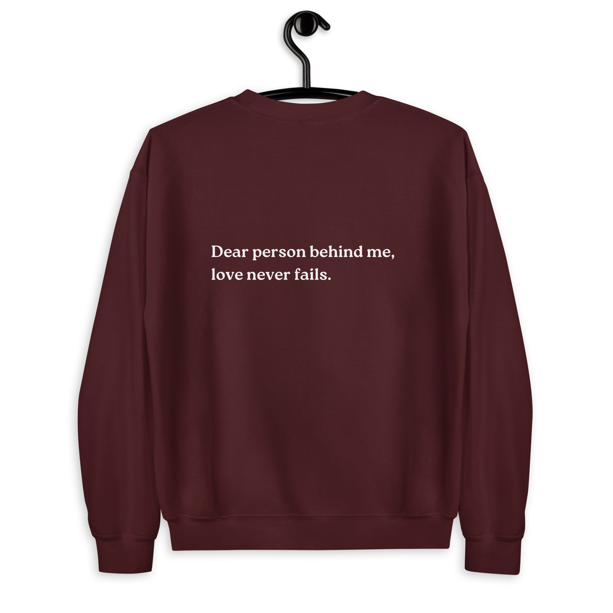 love never fails sweatshirt maroon
