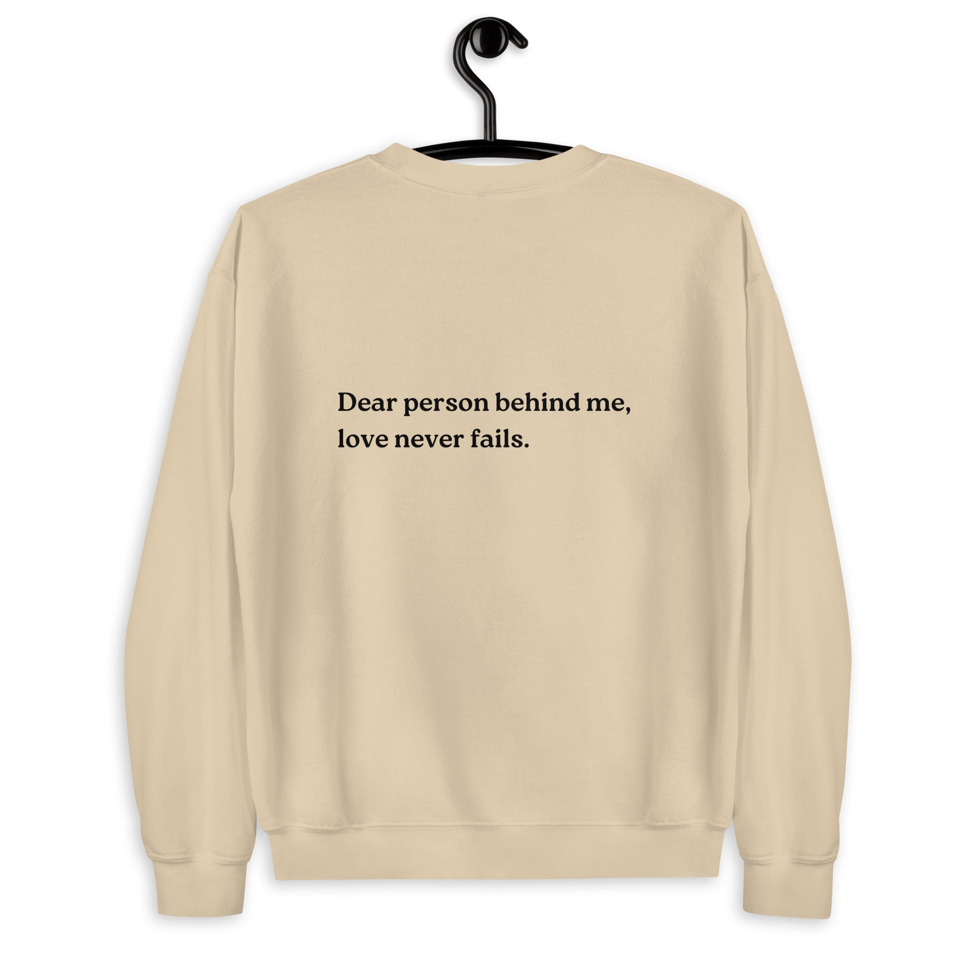 love never fails sweatshirt sand