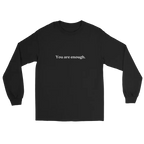 A black long-sleeve crewneck t-shirt with the phrase 'You are enough.' printed in white serif text across the chest, displayed on a solid white background.