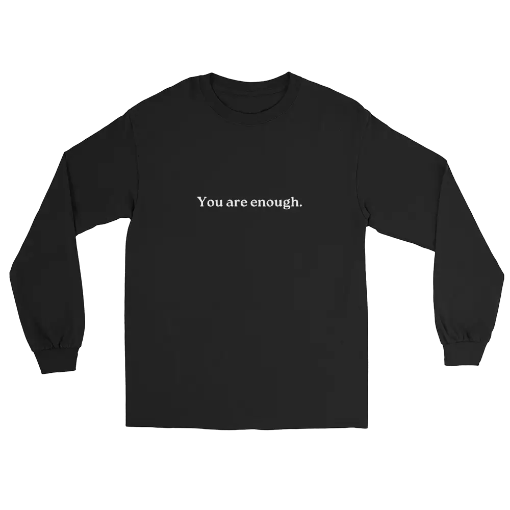 A black long-sleeve crewneck t-shirt with the phrase 'You are enough.' printed in white serif text across the chest, displayed on a solid white background.